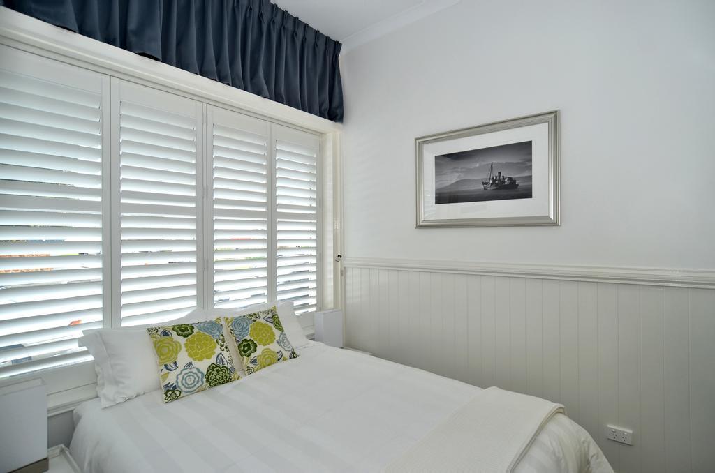 Albany Central Apartments Rum bild