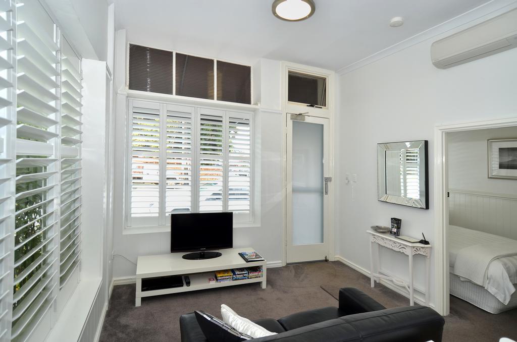 Albany Central Apartments Rum bild