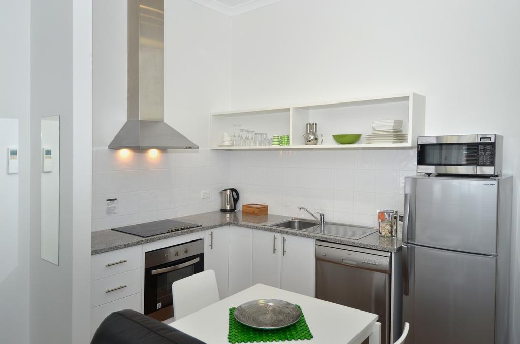 Albany Central Apartments Rum bild