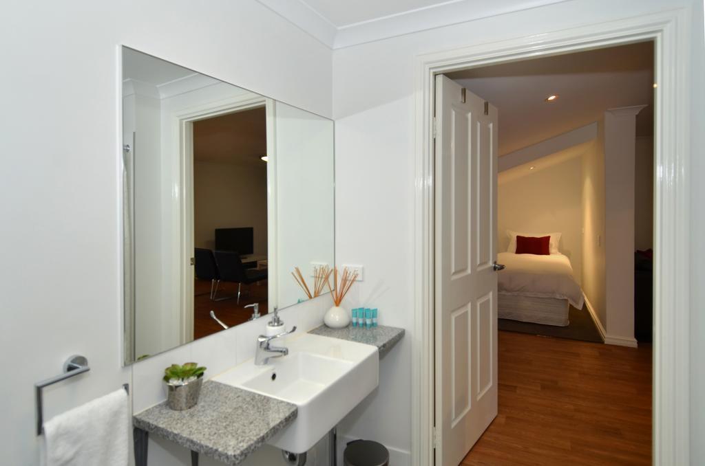 Albany Central Apartments Rum bild