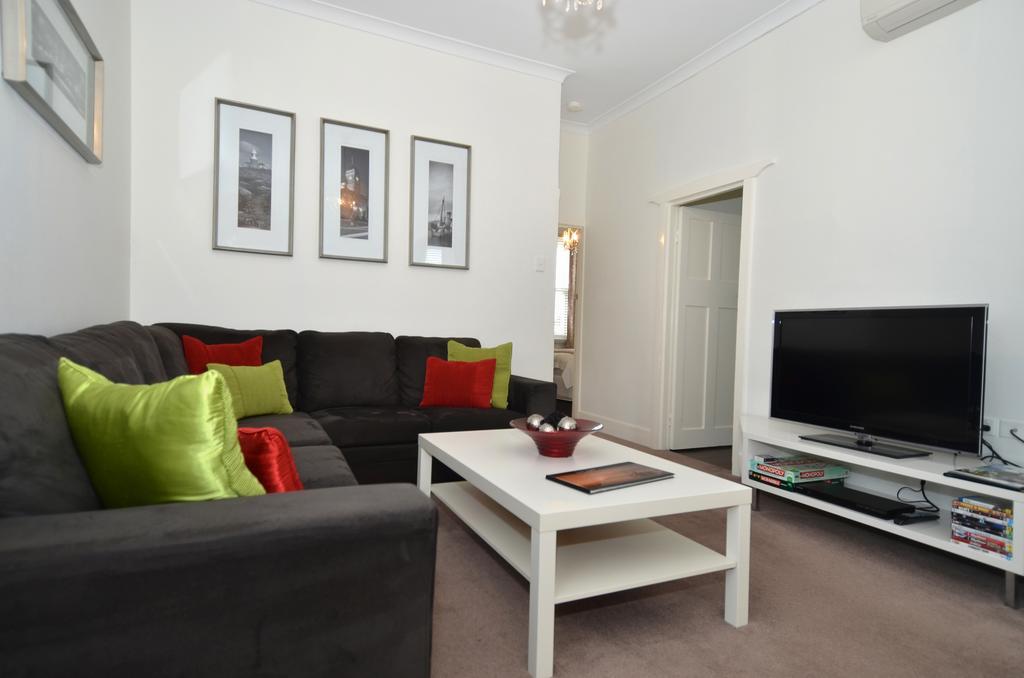 Albany Central Apartments Rum bild